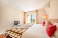 Postel nebo postele na pokoji v ubytování GuestReady - Parede Residence near the beaches