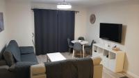 TV a/nebo společenská místnost v ubytování Apartamento Valle-Niza, Almayate, Vélez málaga, torre del mar ,2 dormitorios