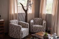 Umkumbe Bush Lodge - Luxury Tented Campにあるシーティングエリア