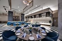 Posezení v ubytování The Fern Residency, Gandhinagar, Series by Marriott