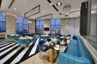 Posezení v ubytování The Fern Residency, Gandhinagar, Series by Marriott