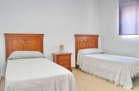 Postel nebo postele na pokoji v ubytování Villa Alonso