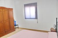 Postel nebo postele na pokoji v ubytování Villa Alonso