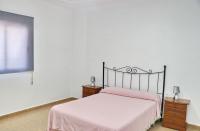 Postel nebo postele na pokoji v ubytování Villa Alonso