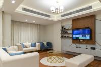TV a/nebo společenská místnost v ubytování Settle Inn Sodic Villette Apartment