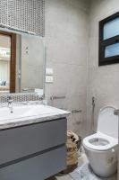 Koupelna v ubytování Settle Inn Sodic Villette Apartment