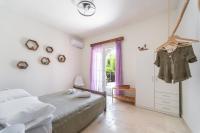 Posteľ alebo postele v izbe v ubytovaní Lake House