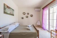 Posteľ alebo postele v izbe v ubytovaní Lake House
