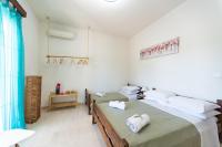Posteľ alebo postele v izbe v ubytovaní Lake House