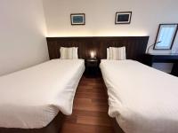 pension sunset beach - Vacation STAY 41230vにあるベッド