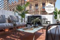Posedenie v ubytovaní Suites Maestranza - Puerta del Arenal by Magno Apartments