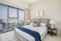 Postel nebo postele na pokoji v ubytování GuestReady - Lux design with top skyline view