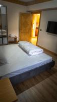 Postel nebo postele na pokoji v ubytování Ayder Elif Apart Daire