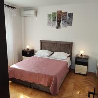 Postel nebo postele na pokoji v ubytování Apartment Filip