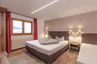 Posteľ alebo postele v izbe v ubytovaní Hotel Garni Schönblick