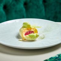 a white plate with a piece of food on it at Matfen Hall Hotel, Golf & Spa in Matfen