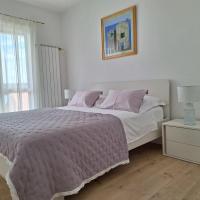 Posteľ alebo postele v izbe v ubytovaní Ceratonia Apartments