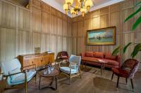 A seating area at NH Collection Madrid Suecia