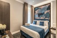 Łóżko lub łóżka w pokoju w obiekcie Hotel 55 Fifty-Five - Maison d'Art Collection