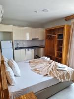Postel nebo postele na pokoji v ubytování My Solmaz Hotel