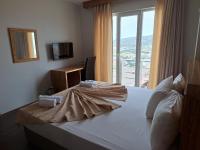Postel nebo postele na pokoji v ubytování My Solmaz Hotel