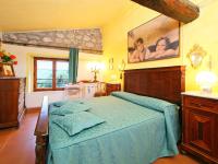 A bed or beds in a room at Holiday Home Il Casale by Interhome