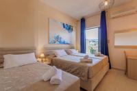 Posteľ alebo postele v izbe v ubytovaní Primavera Hotel
