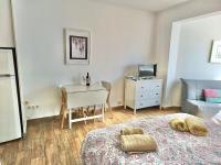 A bed or beds in a room at APARTAMENTO TORRESOL studio NSFC TORRECILLA NERJA