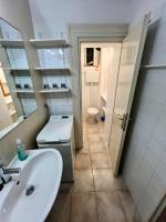 Kúpeľňa v ubytovaní Nugal Apartment