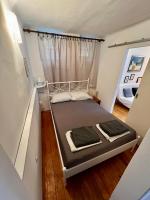 Posteľ alebo postele v izbe v ubytovaní Nugal Apartment