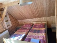 Postel nebo postele na pokoji v ubytování Penzion chalupa zátiší
