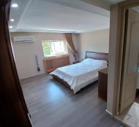 Postel nebo postele na pokoji v ubytování Loft inn les berges du lac 1
