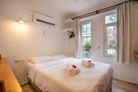 Postel nebo postele na pokoji v ubytování Hideaway