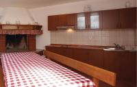 Łóżko lub łóżka w pokoju w obiekcie Apartment Plomin Iv
