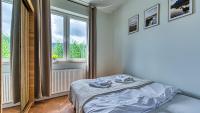 Posteľ alebo postele v izbe v ubytovaní Apartament Winter Feel z prywatną SAUNĄ - 5D Apartments