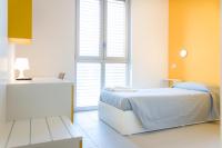 Posteľ alebo postele v izbe v ubytovaní Hotel Campus Sanpaolo