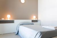 Posteľ alebo postele v izbe v ubytovaní Hotel Campus Sanpaolo