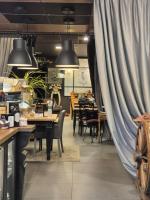 A restaurant or other place to eat at Elena House Apartments