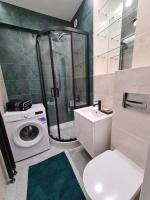 Kúpeľňa v ubytovaní Apartament lazurowy