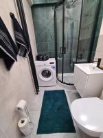 Kúpeľňa v ubytovaní Apartament lazurowy
