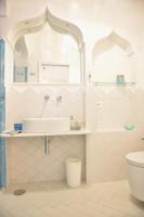 a bathroom with a sink and a toilet at Casa Mulini in Positano
