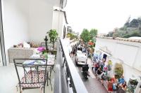 a group of people standing on a balcony at Casa Mulini in Positano