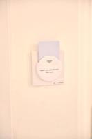 a white box with a sign on a white wall at Casa Mulini in Positano