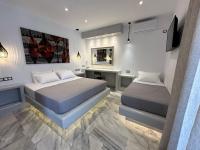 Posteľ alebo postele v izbe v ubytovaní Aphrodite Hotel & Apartments