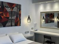 Posteľ alebo postele v izbe v ubytovaní Aphrodite Hotel & Apartments