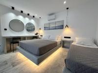 Posteľ alebo postele v izbe v ubytovaní Aphrodite Hotel & Apartments