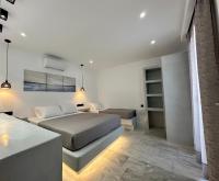 Posteľ alebo postele v izbe v ubytovaní Aphrodite Hotel & Apartments