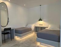 Posteľ alebo postele v izbe v ubytovaní Aphrodite Hotel & Apartments