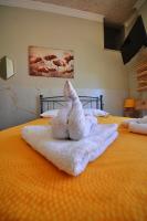 Posteľ alebo postele v izbe v ubytovaní Bikakis Family Apartments
