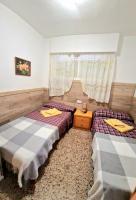Postel nebo postele na pokoji v ubytování Apartment Svetlana 7